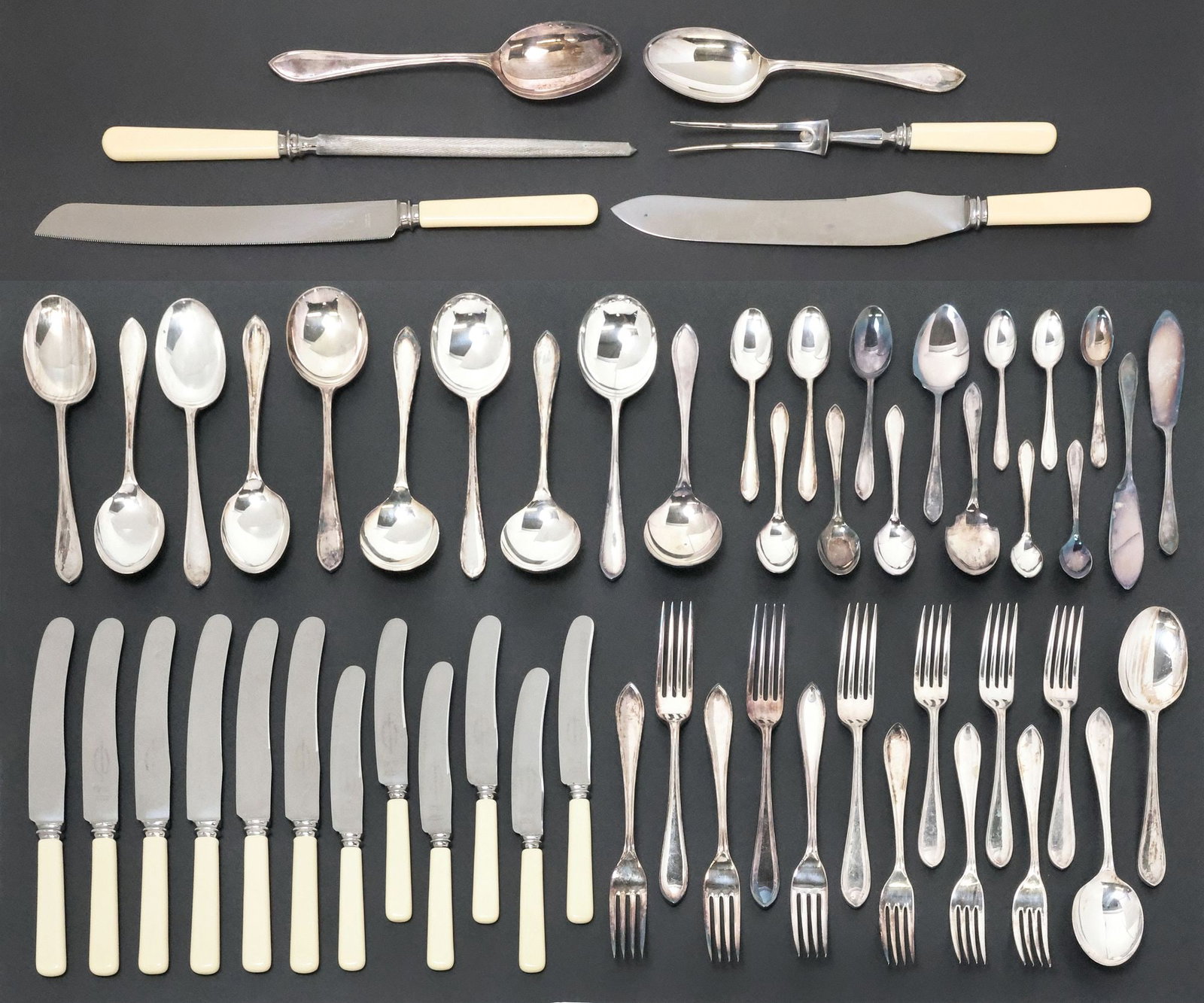 (57) ENGLISH SHEFFIELD SILVERPLATE FLATWARE SERVICE IN FITTED OAK BOX: (lot of 57) English silverplate flatware service, Sheffield, early 20th c., a service for six with additional serving pieces, no observed monograms, including: (12) celluloid-handled knives, with stai