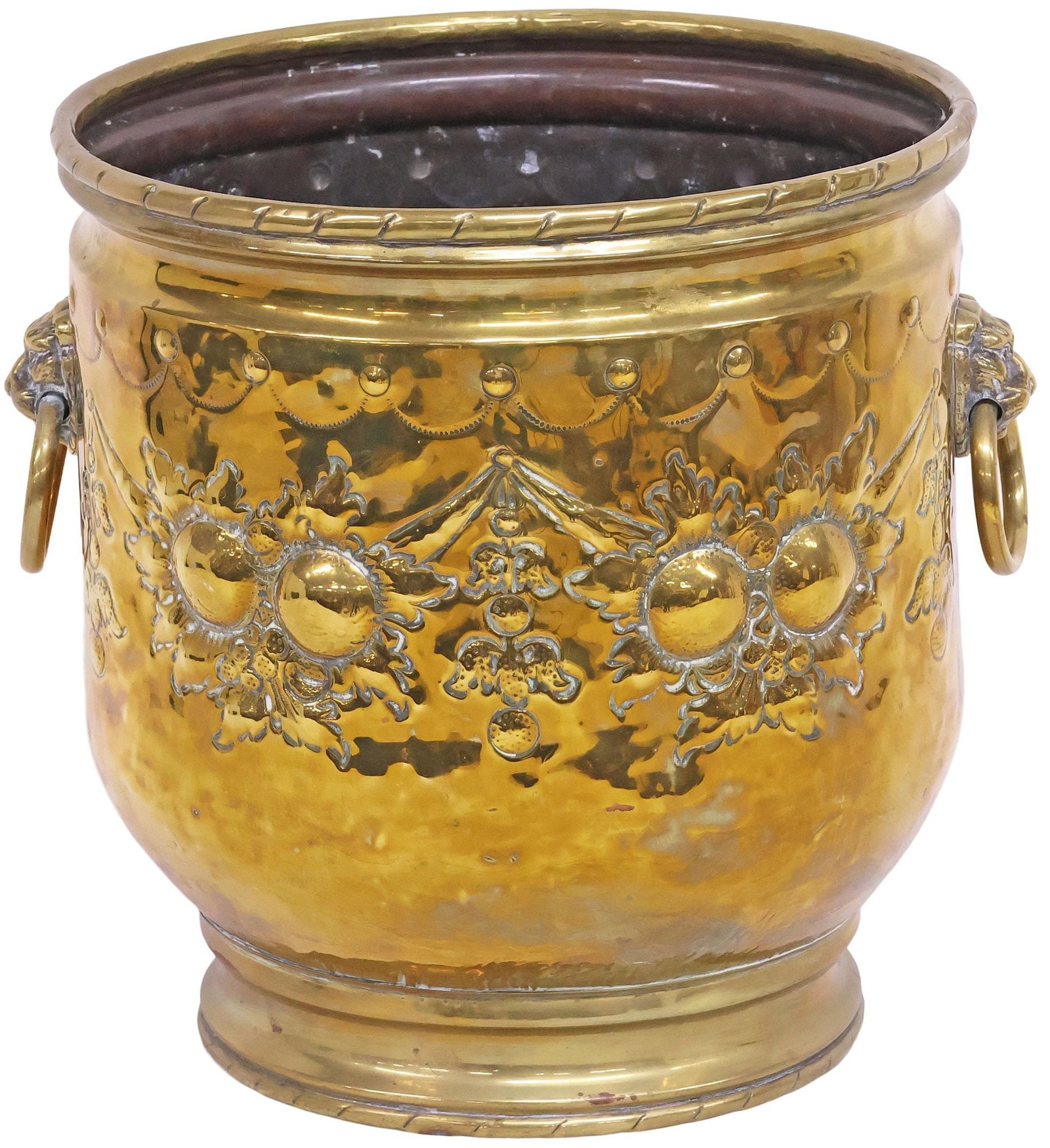 ENGLISH VICTORIAN REPOUSSE BRASS PLANTER / JARDINIERE: English Victorian brass planter/ jardiniere, late 19th c., rolled rim, over circular basin with repousse swags of fruit, flanked by dual lion mask and captured ring handles, approx 15"h, 17"w, 14.25"d