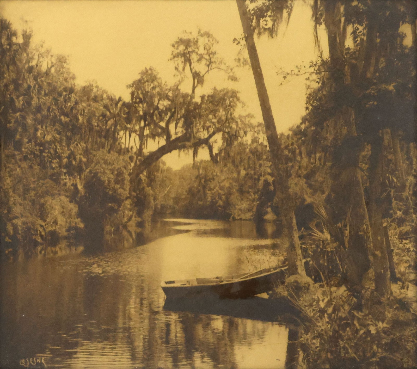 RICHARD LESESNE (1880-1946) OROTONE PHOTOGRAPH, FLORIDA RIVER LANDSCAPE: Framed gold-tone photograph on glass, Florida River Landscape with Rowboat and Willows, signed in the negative lower left LeSesne (Richard LeSesne, Florida, 1880-1946), not examined out of frame, sigh