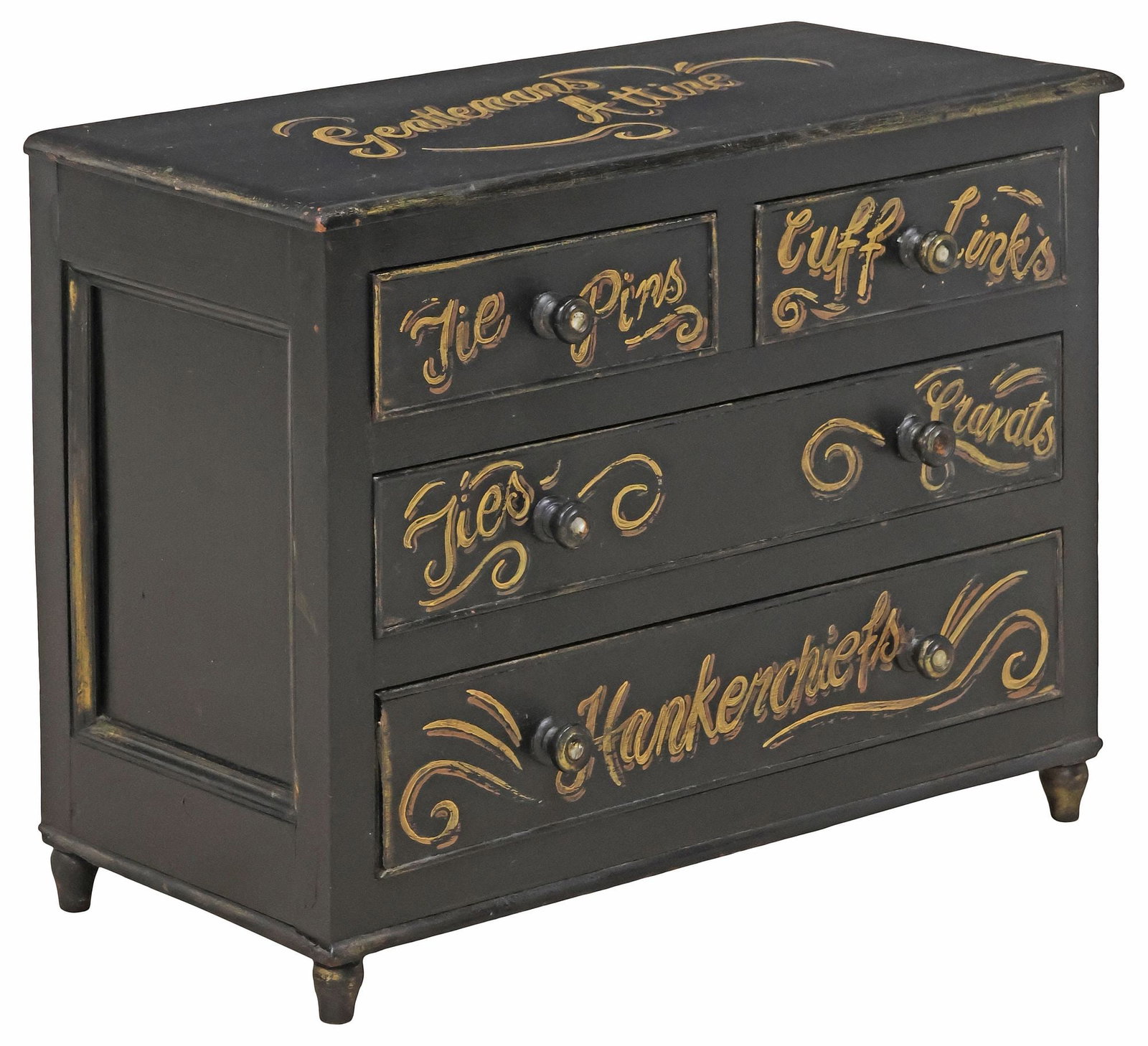 ENGLISH PAINT-DECORATED 'GENTLEMAN'S ATTIRE' TABLETOP CHEST OF DRAWERS: English paint-decorated tabletop chest of drawers, early 20th c., the exterior later painted with various gentlemen's accessory labels, including cuff links, ties, and handkerchiefs [sic] on black gro