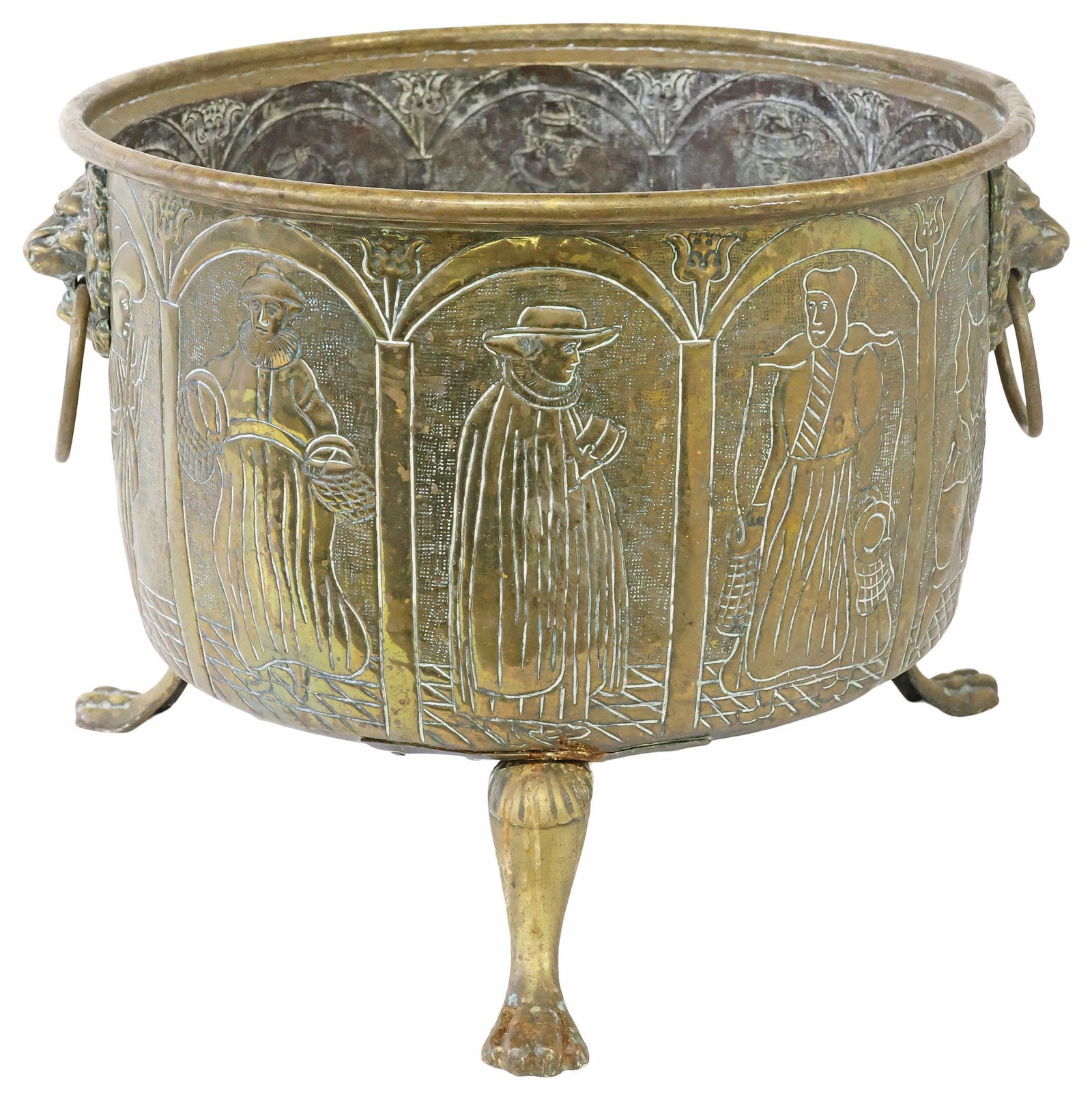 ENGLISH CHASED BRASS JARDINIERE / PLANTER WITH PASTORAL FIGURES: English brass jardiniere/ planter, 19th c., circular basin with dual lion mask ring handles, with chased reserves of pastoral figures, rising on paw feet, approx 14"h, 19.25"w, 19.25"d,