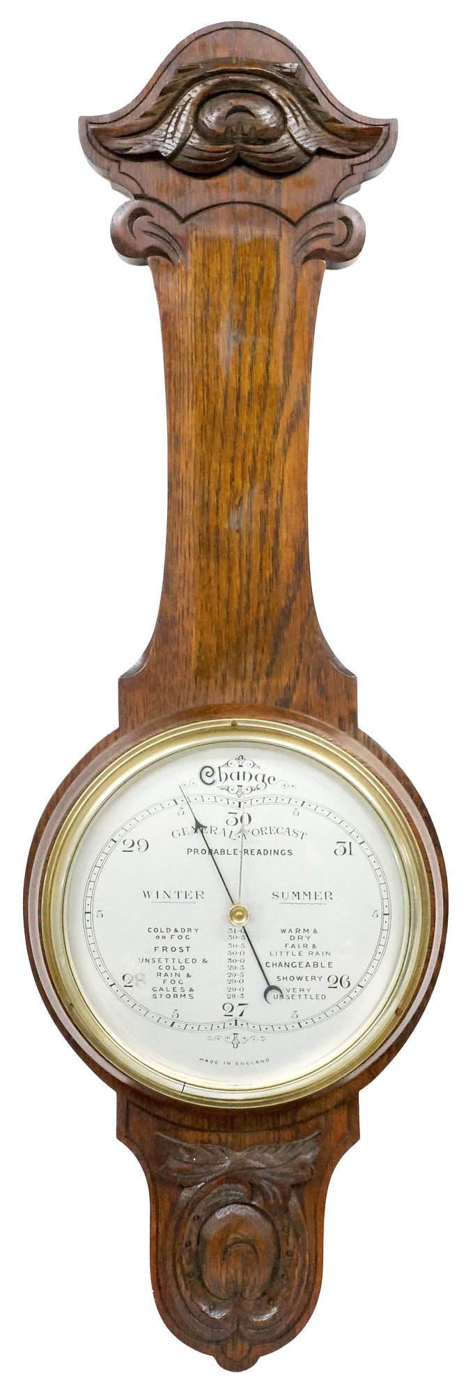 ENGLISH EDWARDIAN CARVED OAK WALL-MOUNTED BAROMETER: English Edwardian carved oak wall-mounted barometer, early 20th c., having arched crest with scrolled foliates, centering silver-tone metal dial, reverse retaining Jay's The Jewelers plaque and ad