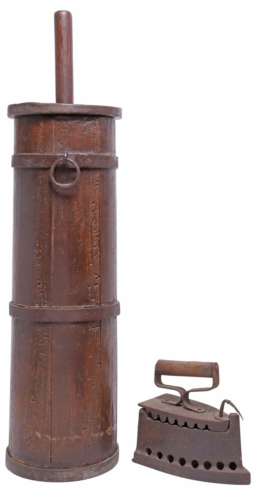 (2) RUSTIC STAVE-BOUND OAK BUTTER CHURN & PATINATED CLOTHES IRON: (lot of 2) Rustic Continental houseware, 19th c., including: (1) stave-bound oak butter churn, with iron straps and ring handle, approx 30"h, 7.5"diam; (1) patinated clothes iron, with cylindrical woo