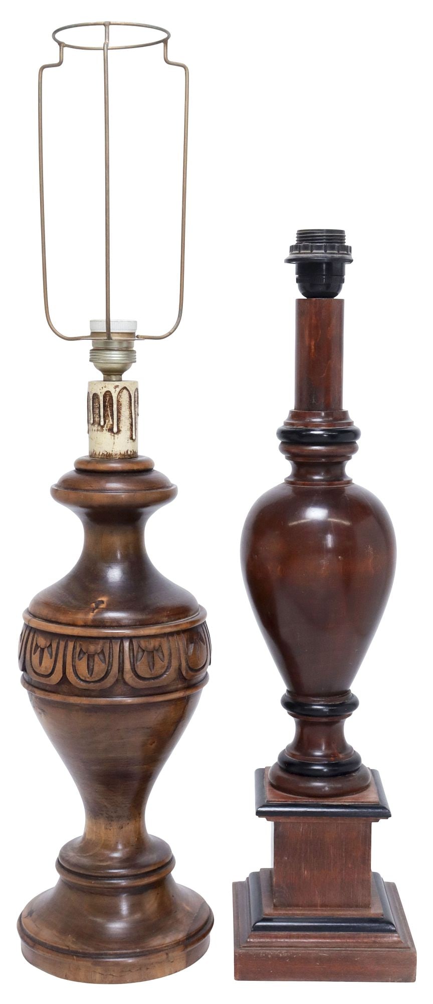 (2) CONTINENTAL CARVED WOOD VASIFORM 1-LIGHT TABLE LAMPS: (lot of 2) Continental carved wood single-light table lamps, 20th c., each having vasiform candlestick-shaped frame, in need of wiring, including: (1) with faux candle over foliated trim, on integral 