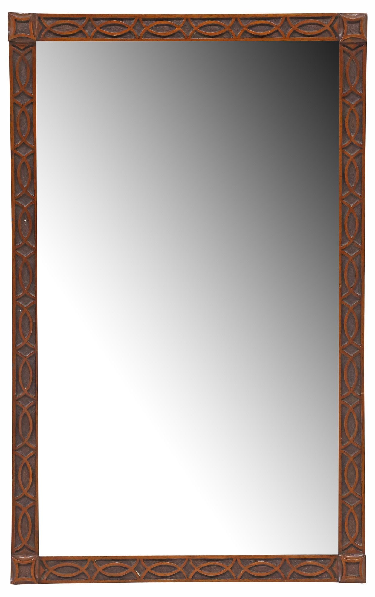 ENGLISH EDWARDIAN CARVED MAHOGANY BEVELED WALL MIRROR: English Edwardian carved mahogany wall mirror, early 20th c., rectangular frame with carved geometric tracery, encasing beveled mirror plate, approx 26 5/8"h, 16.75"w, 12.25lbs