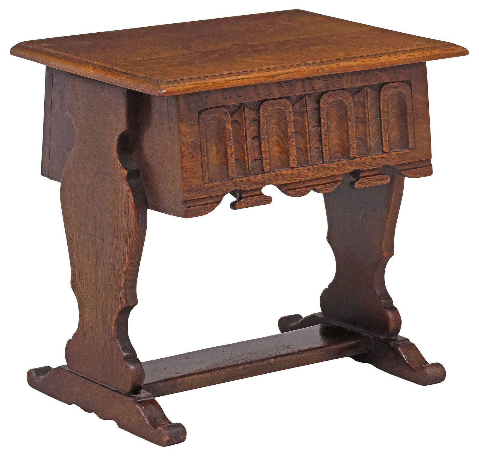 ENGLISH CARVED OAK LIFT-TOP BOX STOOL W/ LIFT TOP: English oak box stool, early 20th c., hinged rectangular top revealing open storage, carved apron, rising on shaped trestle supports, ending on stretcher joined molded shoe feet, approx 19"h, 20.5"w, 