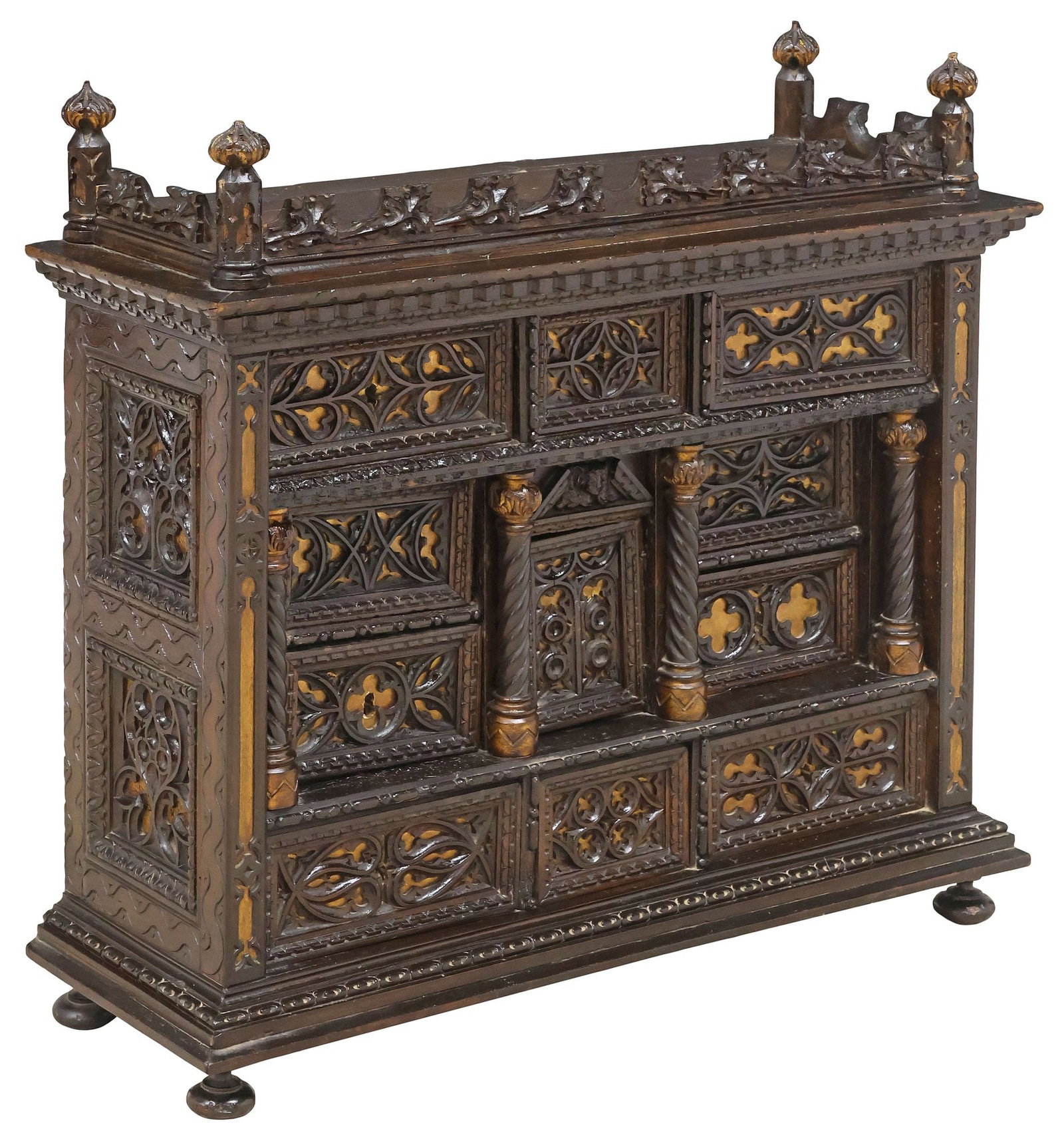 SPANISH BAROQUE PARCEL-GILT CARVED WALNUT VARGUENO CABINET, 18TH C.: Spanish Baroque parcel-gilt carved walnut bargueno/ vargueno cabinet, 18th c., having raised gallery and pointed finials, above paneled rectangular case with architectural tracery motifs, fitted with 
