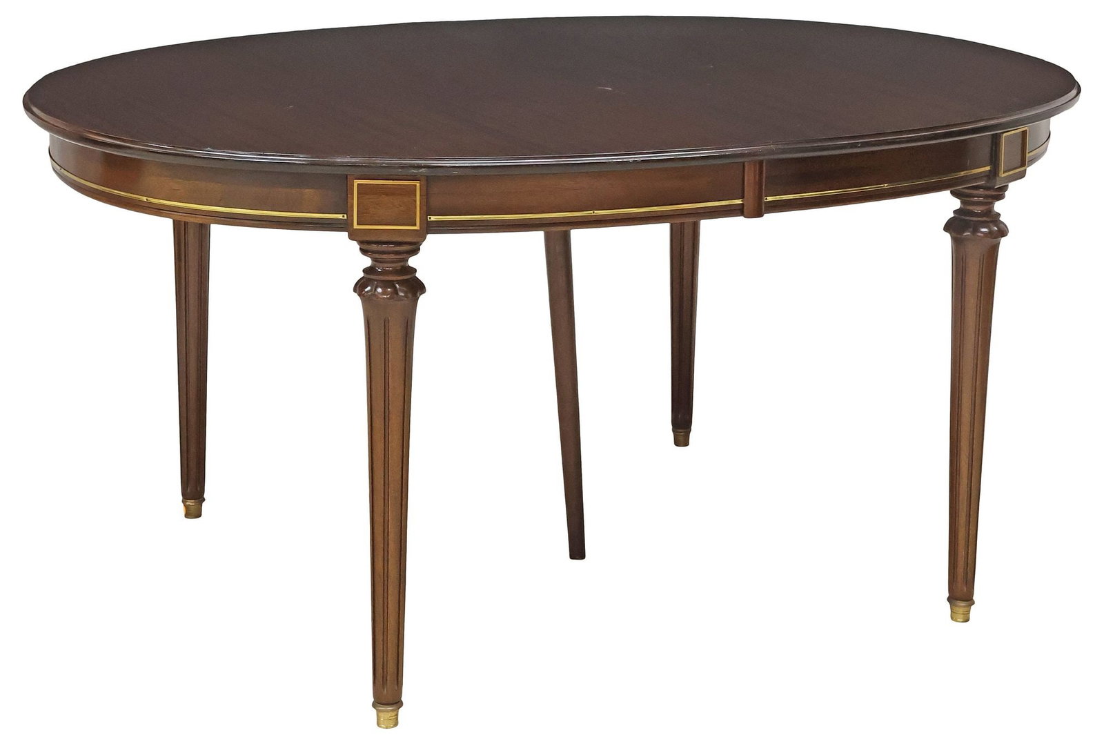 FRENCH LOUIS XVI STYLE MAHOGANY EXTENSION DINING TABLE: French Louis XVI style mahogany extension dining table, 20th c., oval tabletop, over apron with gilt-metal trim, rising on tapering fluted legs and brass cap feet, no leaves present, approx 29.75"h, 6