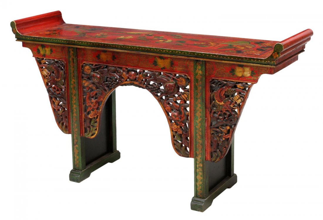 CHINESE FIGURAL DECORATED ALTAR TABLE: Chinese polychrome altar table, early 20th c., primarily red lacquered, the rectangular, the top with up turned ends decorated with figural scenes, the front with elaborated parcel gilt pierced carvin