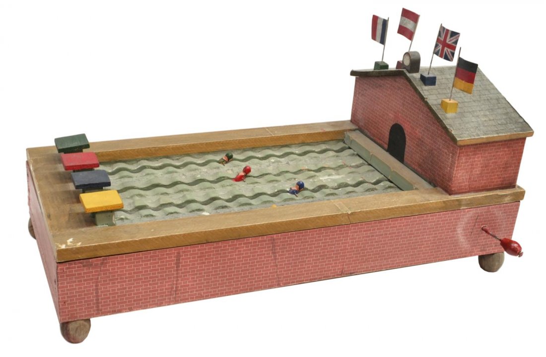 VINTAGE OLYMPIC SWIMMERS AUTOMATON: Vintage automaton, Olympic Swimmers, a four lane pool with start stand and four swimmers representing the countries of Britain, France, Austria, Germany, turning the hand crank causes the competitors 