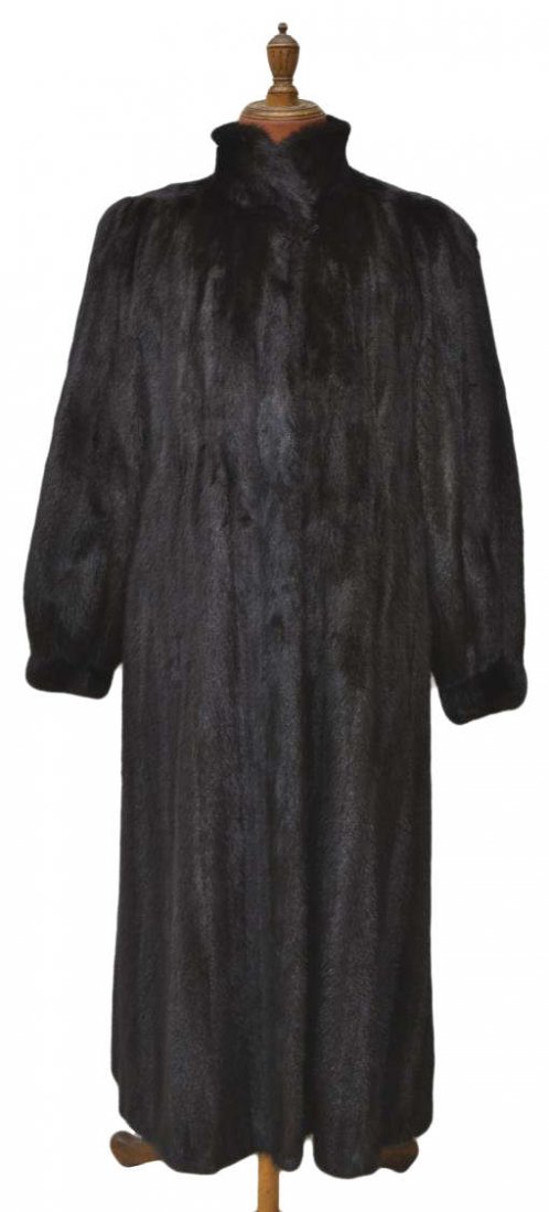 VINTAGE S. GARBER FURS FULL LENGTH MINK COAT: Ladies vintage full length dark brown mink coat, S. Garber Furs, Chicago, two slit pockets, hook and eye closure, approx 21"w (shoulder), 26.5"l (sleeve), overall: 53"l, 6lbs Start Price: $200.00