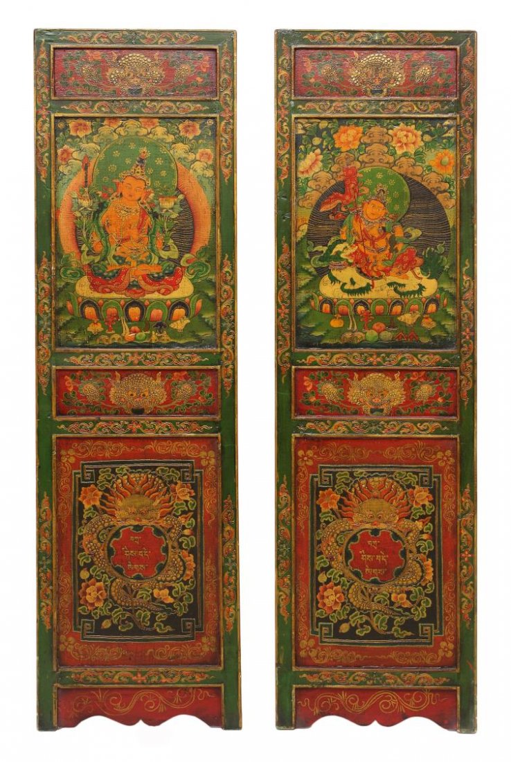 (2) TIBETAN POLYCHROME FIGURAL DOOR PANELS: (pair) Tibetan polychrome door panels, each with floral and figural Vajrayana Buddhist representations on one side, the verso in red with repetitive foliate symbols, 63"h, 17.75"w Start Price: $200.00