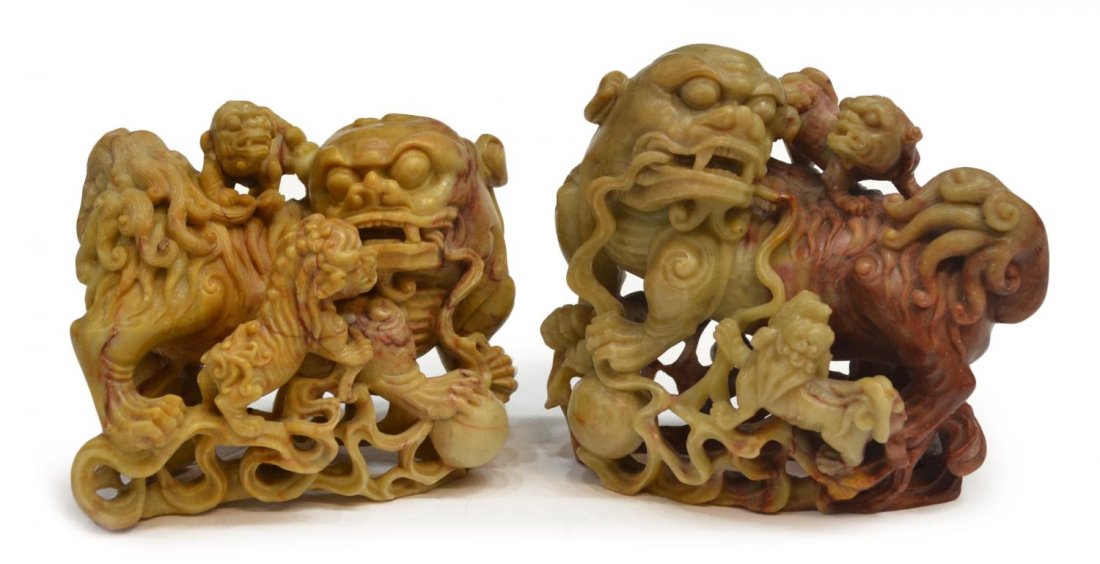 (PAIR) CHINESE SOAPSTONE FIGURAL CARVINGS: (pair) Chinese pierced and carved soapstone figural group, foo lions, 4"h, 4.75"w, 2.25lbs total **Provenance: From a Dallas, Texas estate** Start Price: $50.00