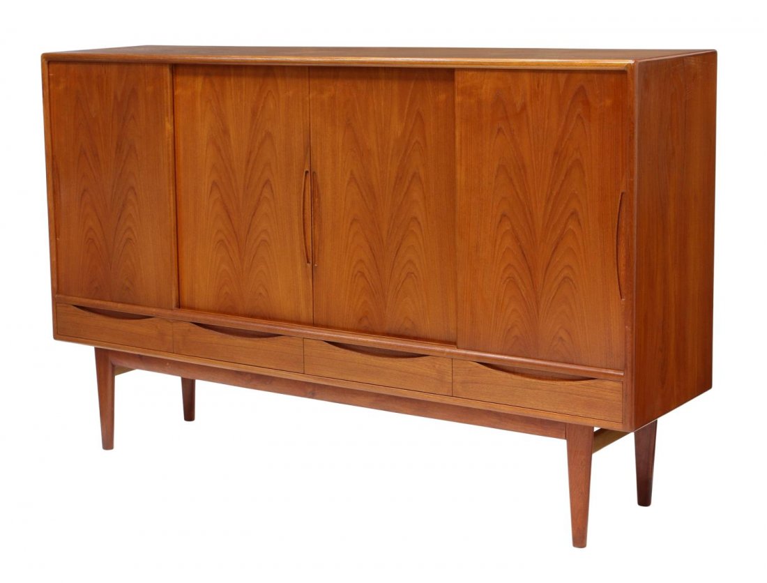 DANISH MID-CENTURY MODERN TEAKWOOD SIDEBOARD: Danish mid-century modern teakwood sideboard, c. 1960, rectangular with three sliding doors over four doors, the interior fitted with a bar area, drawers, and shelves, 45.75"h, 73.25"w, 17"d Start Pri
