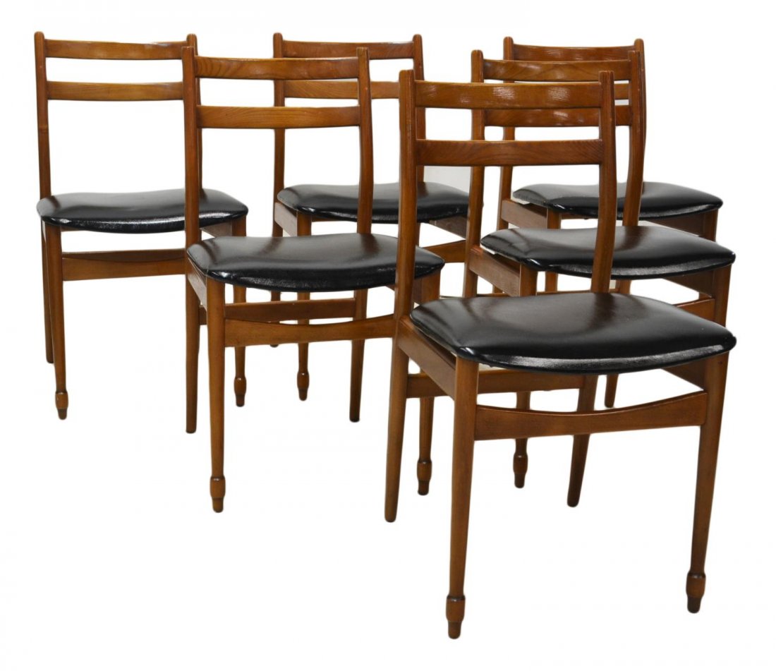 (6)ITALIAN MID-CENTURY MODERN TEAKWOOD SIDE CHAIRS: (set of 6) Italian design mid-century modern teakwood side chairs, c. 1960, each having vertical slat back on curved uprights, black upholstered seats, rise on cylindrical front supports, approx 32"h,