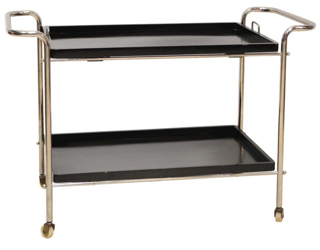 AMERICAN ART DECO TWO-TIERED CHROME SERVICE CART: American Art Deco ebonized wood and chrome tea cart, two-tiered, the top removable tray with handles, restoration to edge, 24.75"h, 37.25"l, 17.75"d Start Price: $100.00