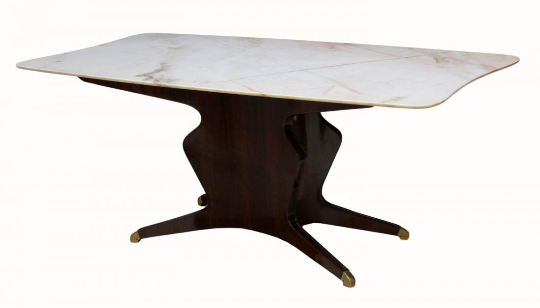 ITALIAN OSVOLDO BORSANI MARBLE TOP DINING TABLE: Italian marble top dining table, design by Osvaldo Borsani (Swiss, Italian, 1911-1985), c. 1940's, the veined stone top resting on a shaped base in a mahogany finish, four legs end in brass caps, unma