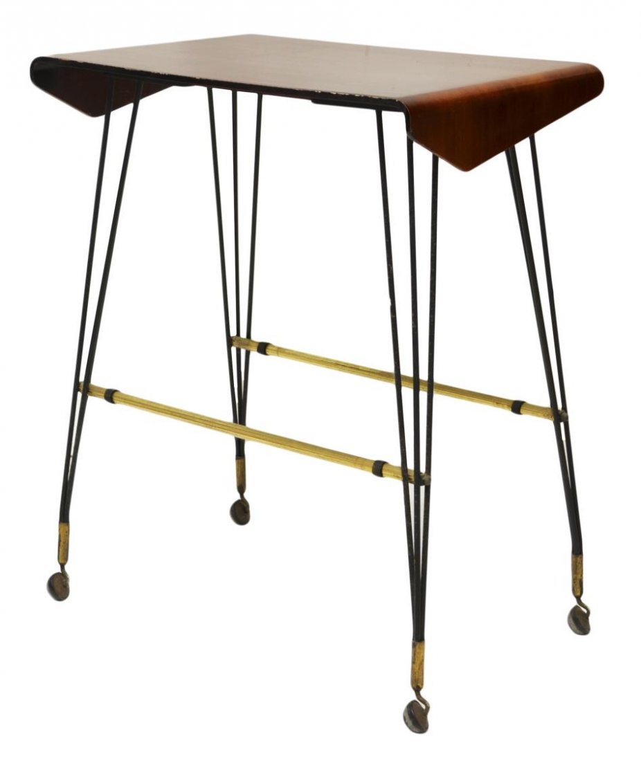 ITALIAN MID-CENTURY MODERN SERVICE CART: Italian service of work table, c. 1960, a rectangular mahogany top with bent sides rising on angular wrought iron legs with castors joined by gilded metal stretchers, 32"h, 26.25"w, 17"d Start Price: