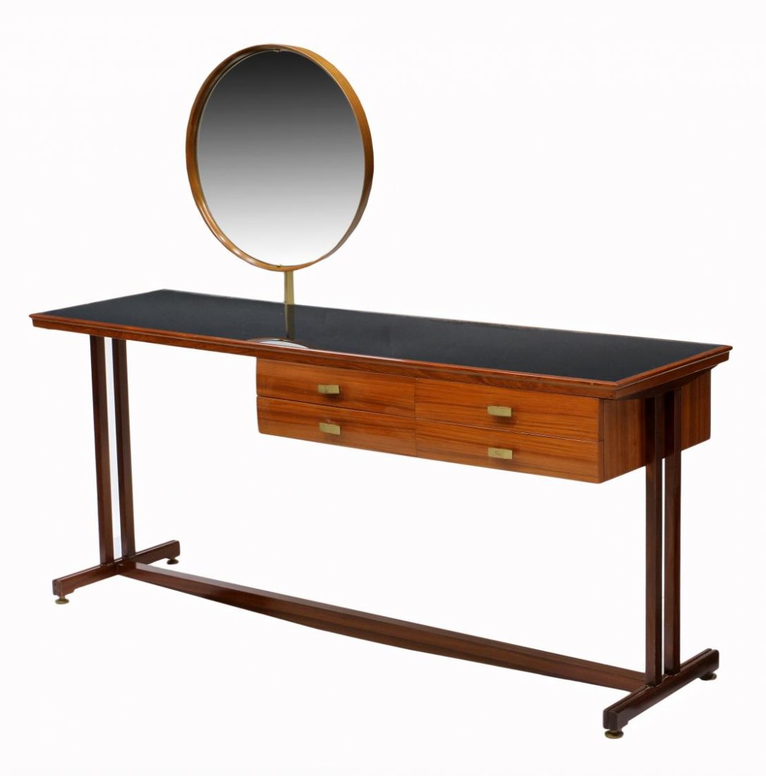 ITALIAN MID-CENTURY MODERN VANITY DRESSING TABLE: Italian mid-century modern open base teakwood vanity dressing table, c. 1950's, a circular tilting mirror over the rectangular glass top, four short drawers at right, rising on a trestle base, 49"h, 5