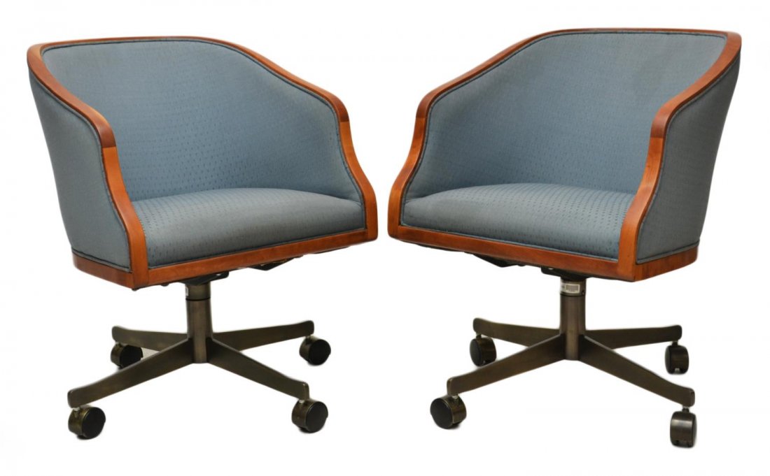 (PAIR) WARD BENETT MODERN SWIVEL OFFICE CHAIRS: (pair) Swivel office chairs, design by Ward Bennett (American, 1917-2003) for Brickel Associates, NY, a shaped wood frame around blue diamond pattern fabric, raised on four steel legs with castors, up