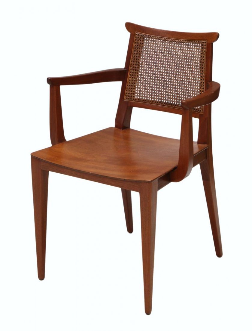 MID-CENTURY MODERN EDWARD WORMLEY ARMCHAIR, DUNBAR: Mid-century modern teakwood armchair, design by Edward Wormley (American, 1907-1995) for Dunbar, Berne, Indiana, shaped curved and caned back, raised on four tapered supports, retaining Dunbar tag und