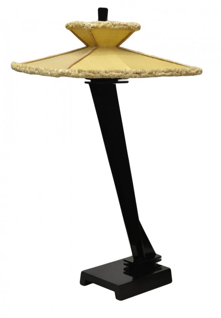 AMERICAN ART DECO STYLE BLACK LUCITE FLOOR LAMP: American Art Deco style black lucite floor lamp, angular standard raised on square base, surmounted by circular form light and triangular finial, accompanied by large cream shade of square form with r