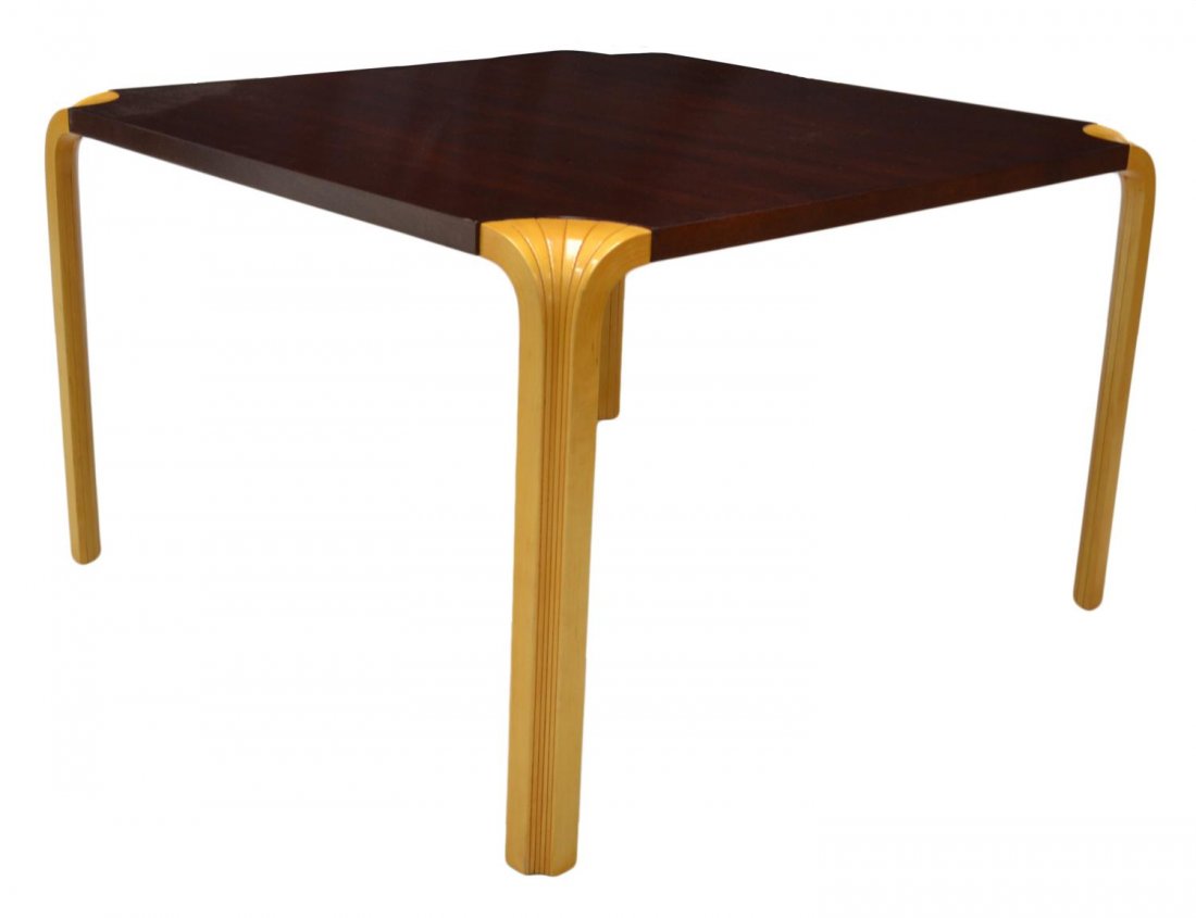 MID-CENTURY MODERN ALVAR AALTO FAN TABLE: Mid-Century modern table, design MX 800 by Alvar Aalto (Finland, 1898-1976), a square mahogany top supported by shaped tapered birch legs, 22"h, 35.5"w, 35.5"d Start Price: $200.00