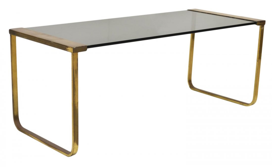 ITALIAN MODERN BRASS & GLASS COFFEE TABLE: Italian modern brass and smokey glass coffee table, design by Willy Rizzo (Italian, 1928-2013), c. 1960's / 70's, some surface wear, 15"h, 38.5"l, 16"w Start Price: $150.00