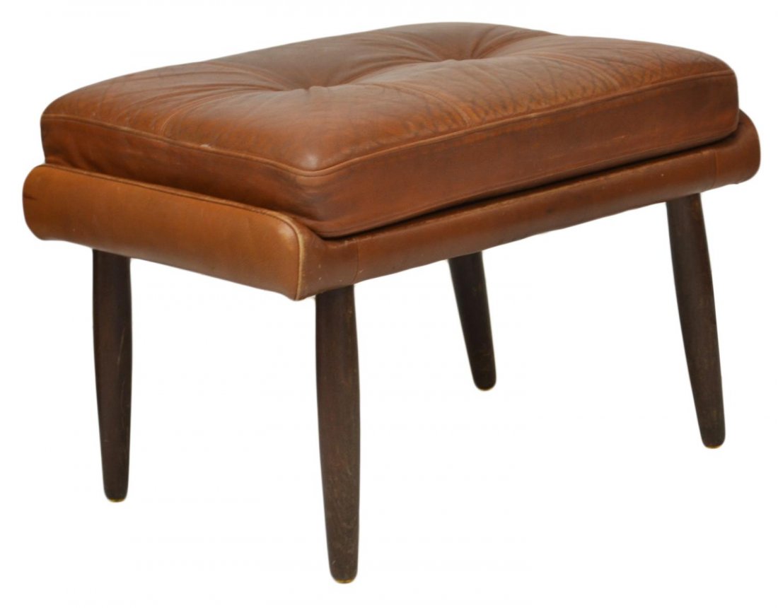 DANISH MID-CENTURY MODERN BROWN LEATHER STOOL: Danish mid-century modern light brown leather stool, the removable rectangular and buttoned cushion rising on tapered and turned wood supports, wear to leather, 16.25"h, 24"w, 17"d Start Price: $80.00