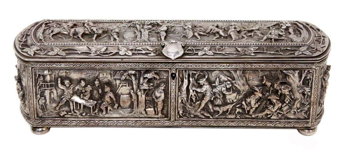 ANTIQUE FRENCH SILVERPLATE REPOUSSE CASKET: Antique French repousse silver plate casket, A.B. and T.E, Paris, the rectangular, locking box thoroughly decorated in relief with lively peasant scenes, hinged lid having a border of leafy vines and 