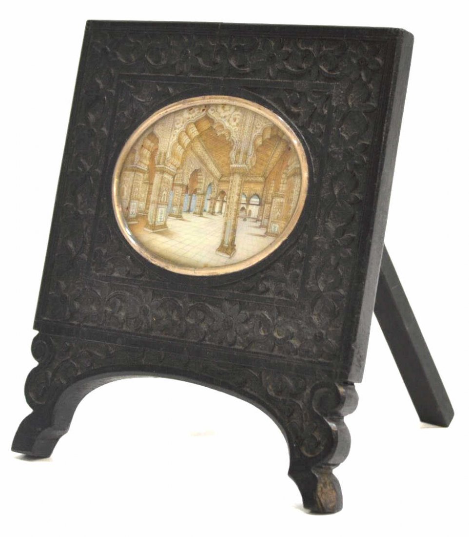 INDIA MINIATURE PAINTING ON IVORY, INTERIOR VIEW: *This lot will not be shipped Internationally* Miniature painting on ivory, India, an interior view, flowering vines in relief on the carved ebony frame, overall: 5.5"h, 4.5"w, .25lb *Provenance: The