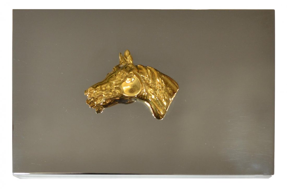 HERMES SILVERPLATE & GILT HORSE HEAD TABLE BOX: Hermes silver plate cigarette box, by Ravinet d'Enfert, France, (1845-1984), the rectangular top mounted with a gilt horse head in profile, hinged lid revealing wood lined open interior, 1.25"h, 7.5"w
