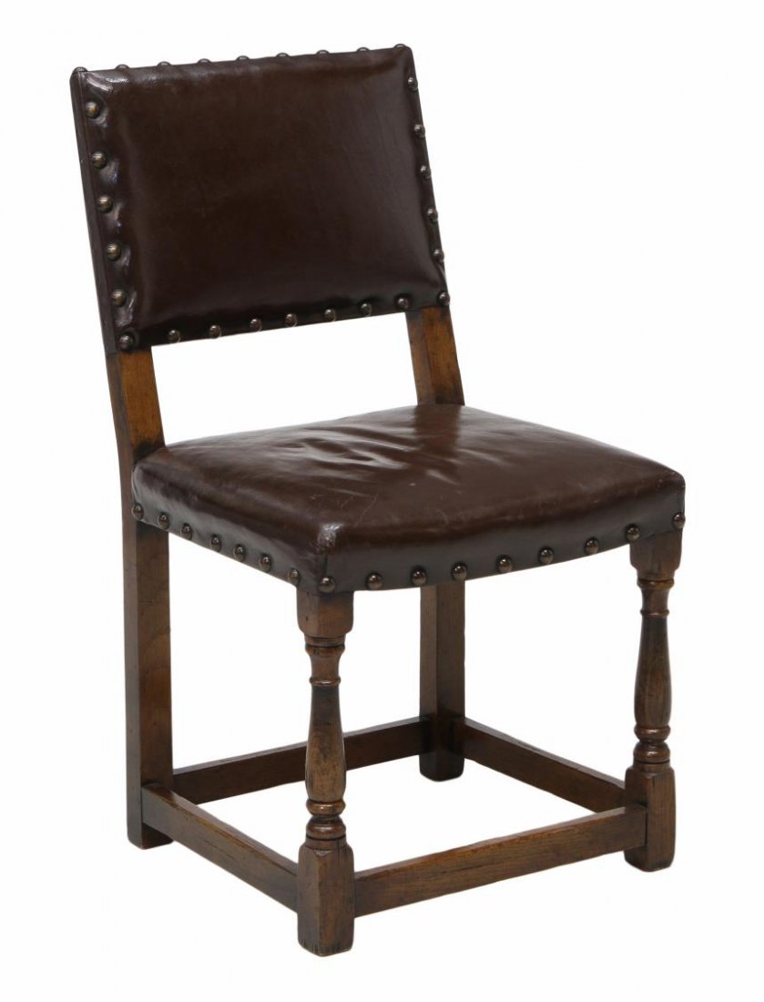 LEATHER UPHOLSTERED & CARVED WOOD SIDE CHAIR: Leather upholstered side chair having large nail head trim, turned front legs joined by stretchers and raised on block supports, 35"h, 19"w, 17"w *Provenance: The estate of Douglas B. Marshall (1917-2