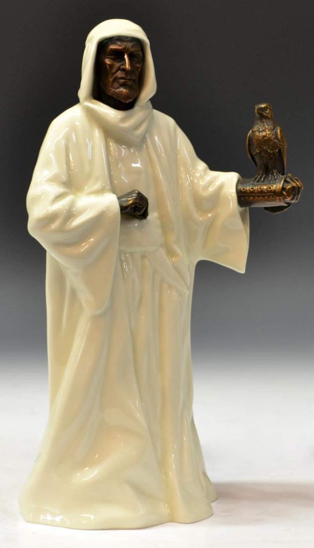 MINTON BONE CHINA ORIENTALIST FIGURE, 'THE SHEIKH': Minton white bone china and bronze figural group, 'The Sheikh', MS 3, c. 1978, the robed figure with outstretched arm supporting a falcon, marked underfoot, approx 10"h, 5.5"w, 4"d, 1.25lbs *Provenanc