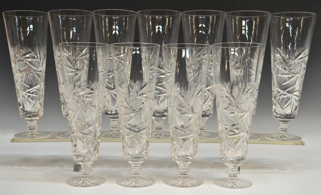 (11) CZECHOSLOVAKIAN CUT CRYSTAL ICED TEA GLASSES: (lot of 11) Czechoslovakian cut crystal tall iced tea glasses, in 'Pinwheel' pattern having short ribbed stem, 7.75"h, 6.5lbs total *Provenance: The estate of Douglas B. Marshall (1917-2007) and his w