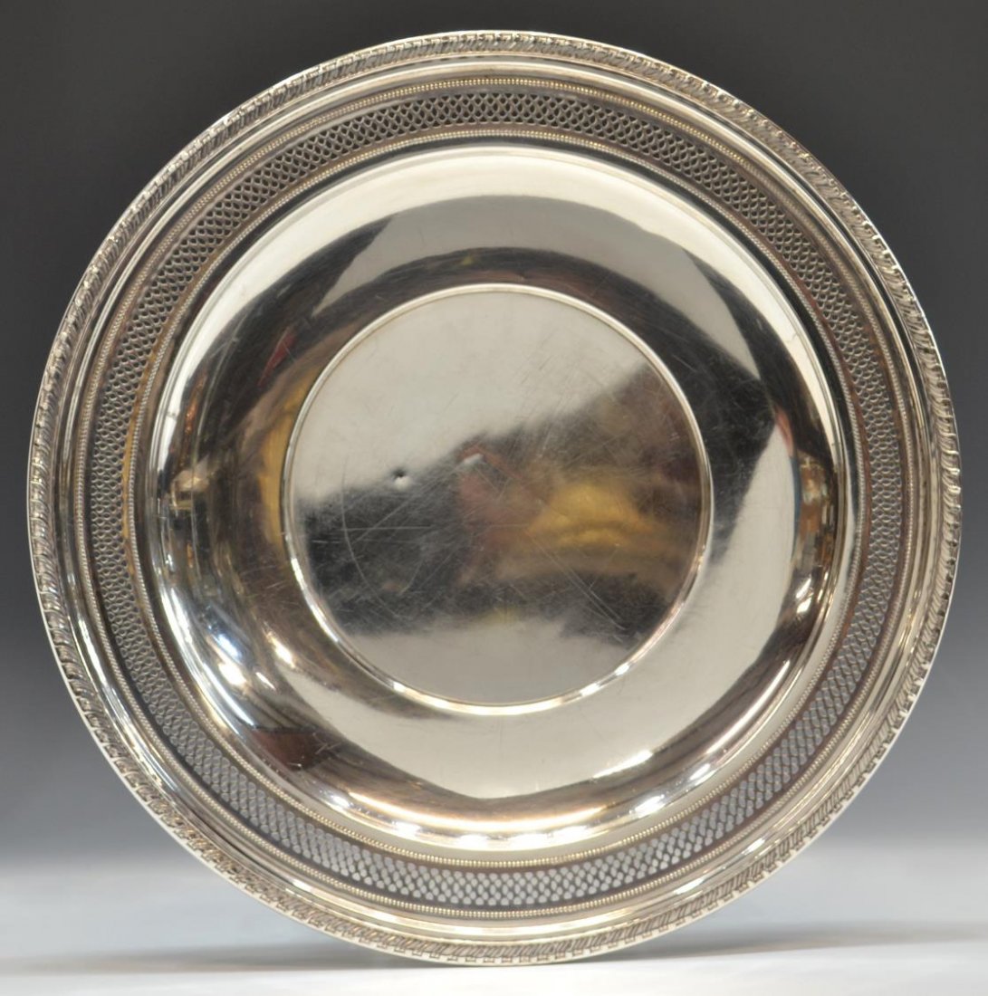STERLING SILVER GADROONED & RETICULATED DISH: Sterling silver dish of ciruclar form, gadrooned rim enclosing reticulated band with beaded border, surface wear, small dent, 11.25"diam, 10.6ozt *Provenance: The estate of Douglas B. Marshall (1917-2