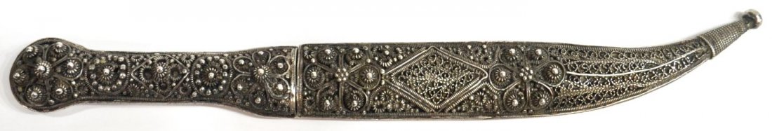 JERUSALEM 950 SILVER KNIFE & SHEATH: Knife marked Jerusalem Silver 950, one side of blade foliate engraved, the handle and sheath with filigree decoration, overall: 9.7/8"l, 3.185ozt *Provenance: The estate of Douglas B. Marshall (1917-2