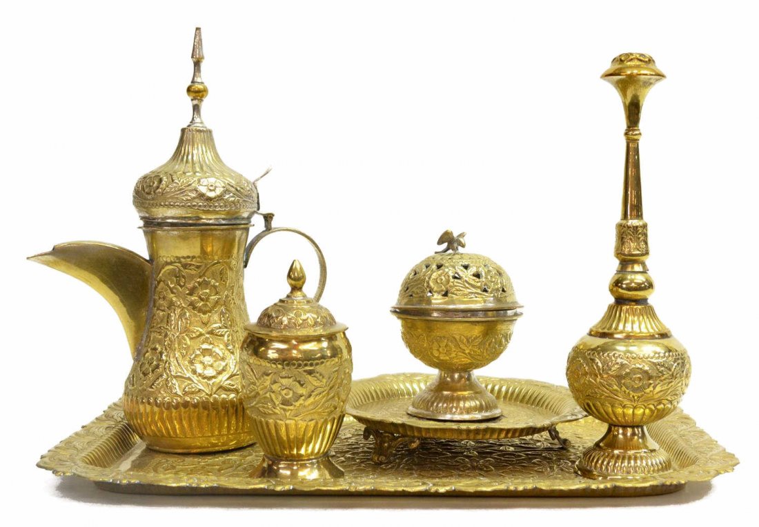 (5)INDIA REPOUSSE GILT METAL ROSEWATER SERVICE SET: (set of 5) Gilt metal ceremonial service set, India, repousse flowering vines repeated throughout, comprising (1) kettle, (1) incense burner on dished stand, (1) lidded jar, (1) rosewater sprinkler an