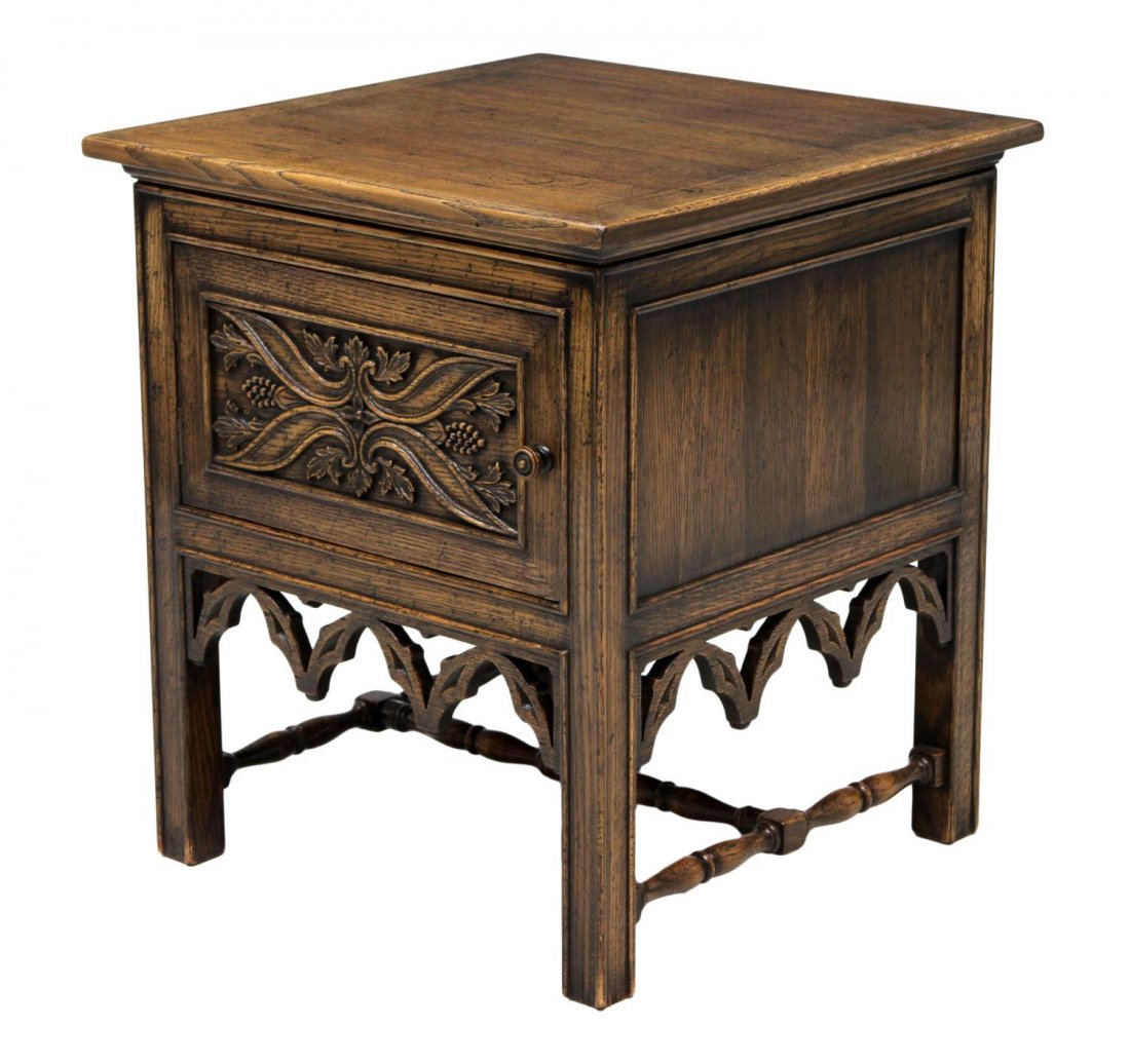 CARVED OAK SINGLE DOOR SIDE CABINET: Oak side cabinet with carved grape vine accents, a square top over a single door, raised on stretcher joined square legs, 27"h, 24"w, 24"d *Provenance: The estate of Douglas B. Marshall (1917-2007) an