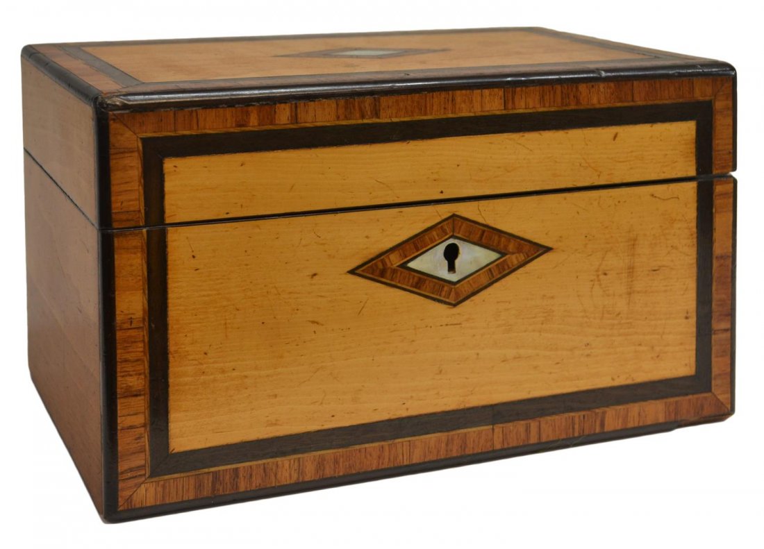 ANTIQUE ENGLISH BANDED WOOD TEA CADDY: English banded wood tea caddy, 19th c., inlaid mother-of-pearl diamond form cartouche and conforming escutcheon, hinged top opening to two removable lids revealing foil lined wells, retaining key, los