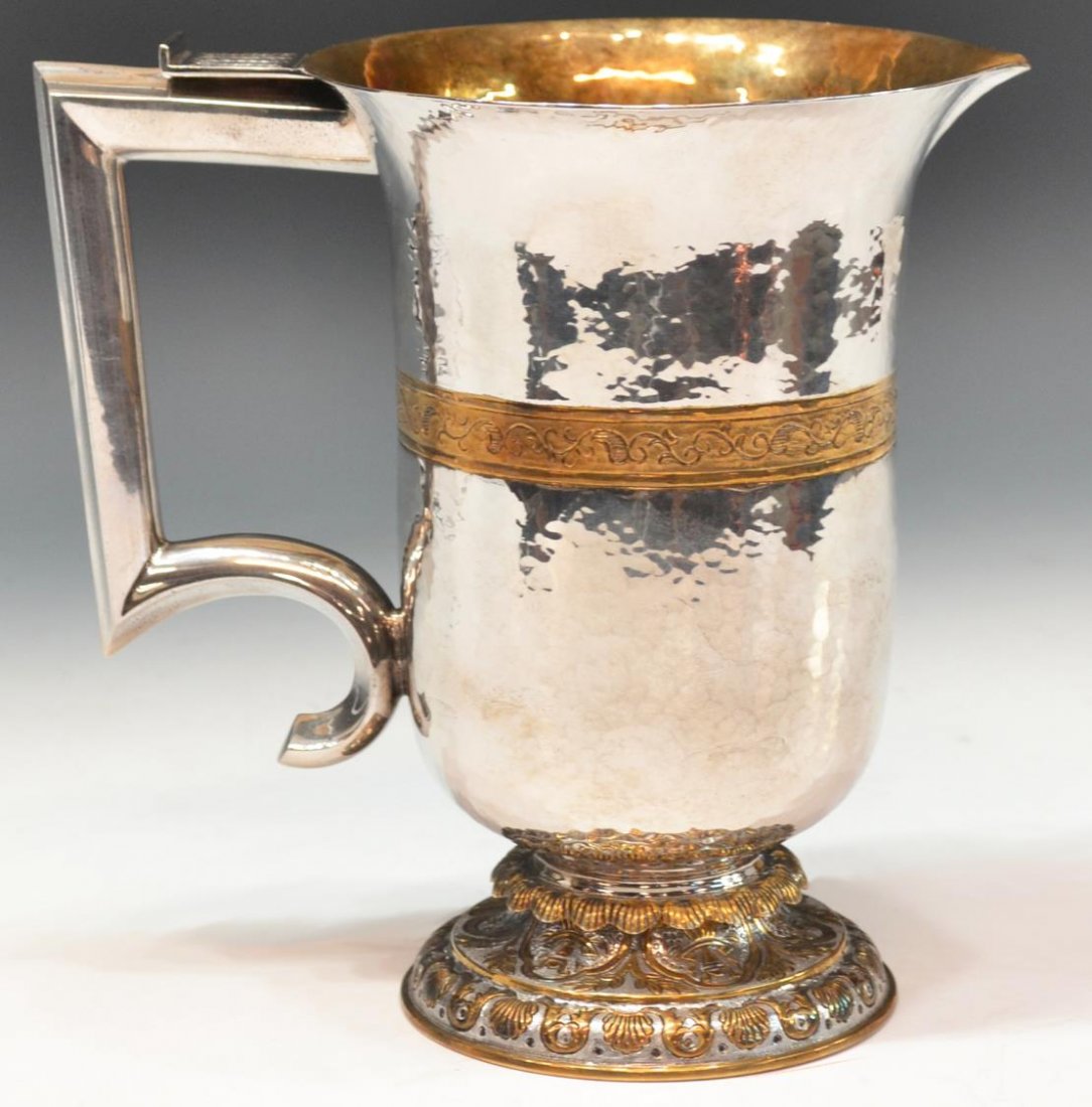 TANE ORFEBRES MEXICO SILVER GILT STERLING PITCHER: Very fine vintage Mexican parcel-gilt sterling silver water pitcher, Tane Orfebres, Mexico City, a stately handle joined to the hammered body, gilded to the interior, trailing foliates engraved to the