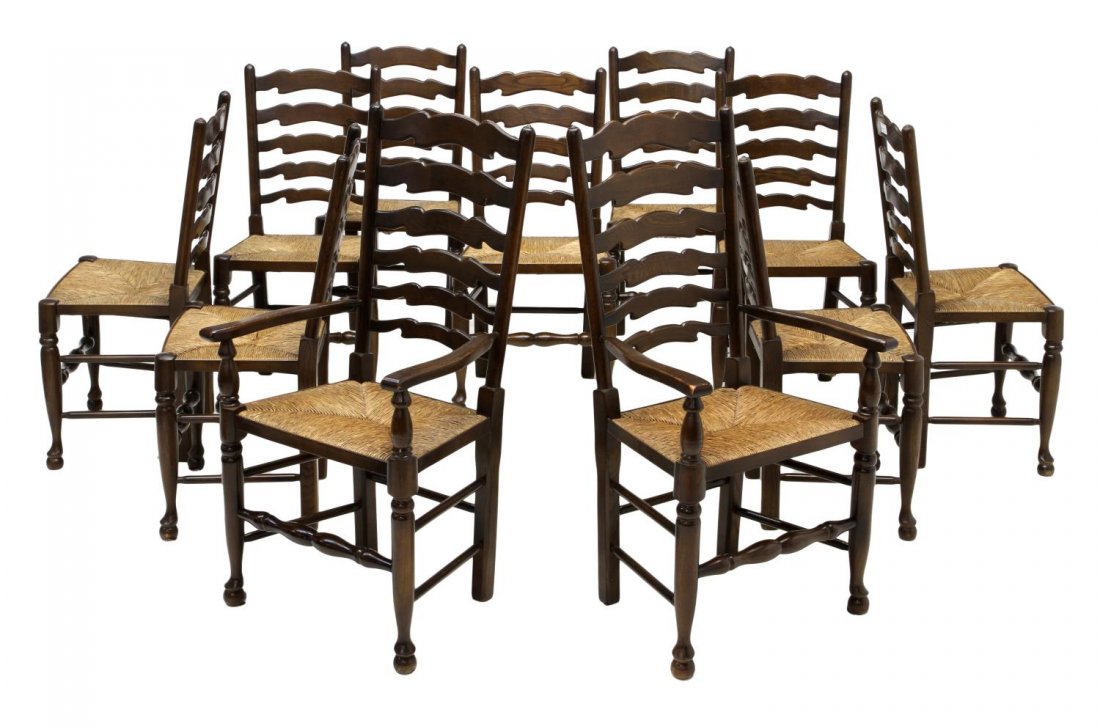 (11) LADDER BACK RUSH SEAT DINING ROOM CHAIRS: (lot of 11) Ladder back dining chairs, 20th c., each with shaped back rails, rush seats, stretcher joined turned legs on pad feet: (2) arm chairs:42"h, 22"w, 20"d; (9) side chairs: 37.25"h, 18.25"w, 1