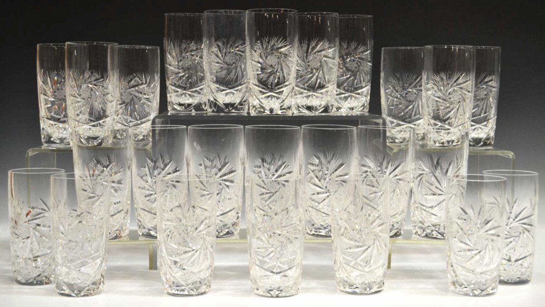 (25) CZECHOSLOVAKIAN CUT CRYSTAL HIGHBALL GLASSES: (lot of 25) Czechoslovakian cut crystal highball glasses, in 'Pinwheel' pattern having starburst base, approx 5.25"h, 22.25lbs total *Provenance: The estate of Douglas B. Marshall (1917-2007) and his 
