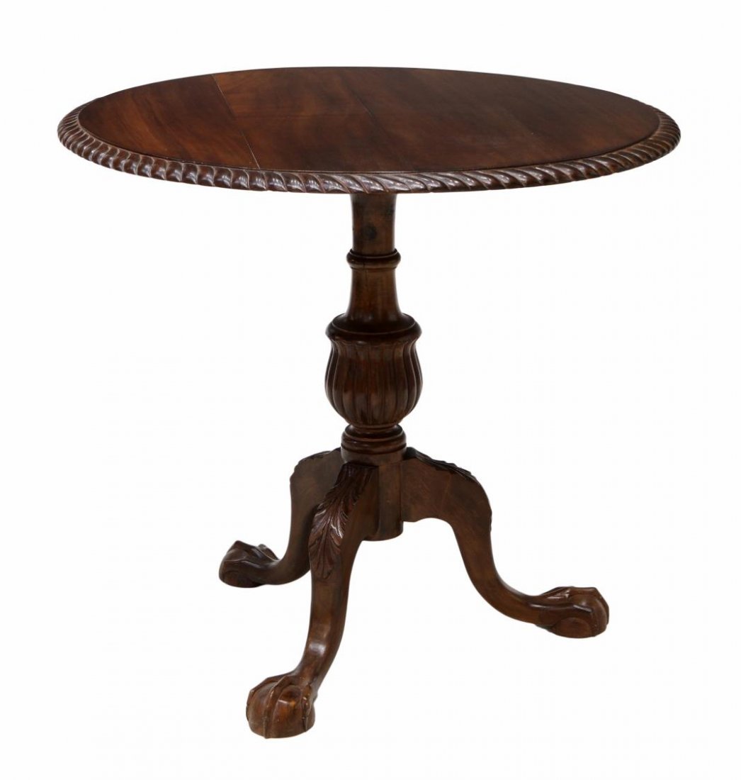 CHIPPENDALE STYLE MAHOGANY TILT TOP TABLE: Chippendale style mahogany tea table, late19th c., the large circular top tilting on a turned tripod base ending in ball and claw feet, repair, top tilted up: 46.25"h, top down: 30.25"h, 32.25"d *Prov