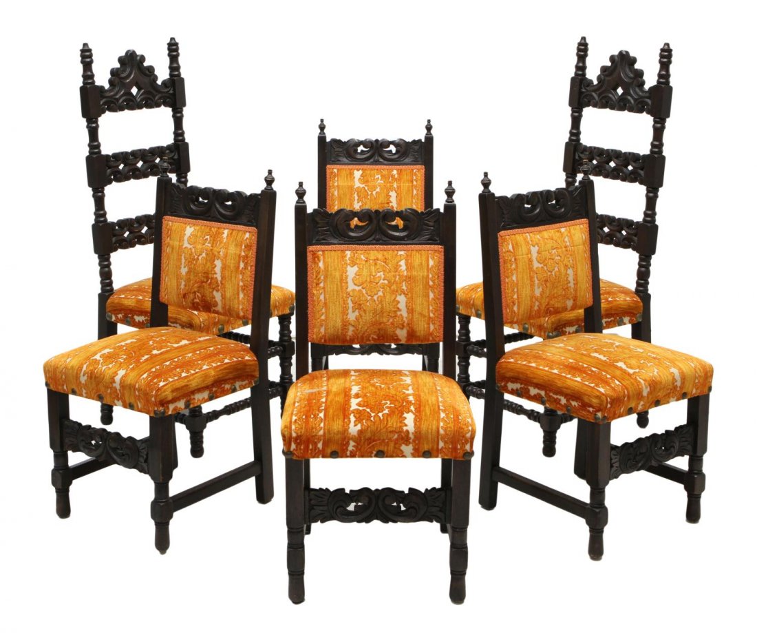 (6) VINTAGE SPANISH STYLE CARVED DINING CHAIRS: (lot of 6) Vintage Spanish style dining room chairs, each in a dark finish with pierced foliate carving, matching upholstered seats: (2) highback chairs: 50.5"h, 19.5"w, 20"d; (4) side chairs: 38"h, 1