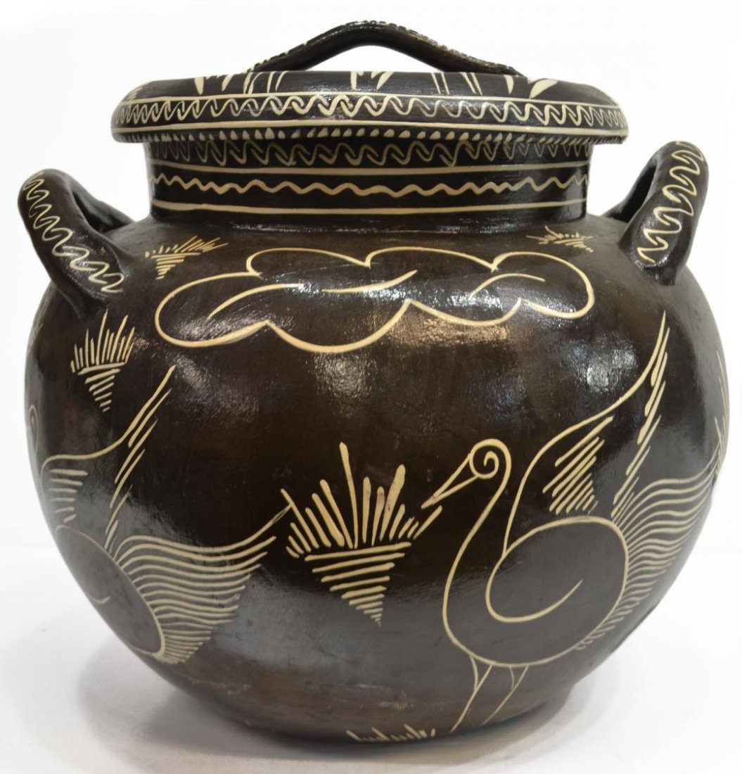 LARGE VINTAGE MEXICO ART POTTERY COVERED JAR, BZ: Large vintage Mexican handled pot with cover, signed BZ, stylized images of birds, deer and foliates, approx 16"h, 16.5"w, 19lbs *Provenance: The estate of Douglas B. Marshall (1917-2007) and his wife