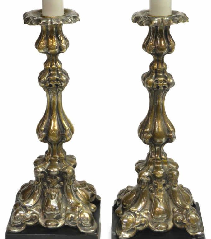 (PAIR) CONTINENTAL SILVERPLATE CANDLESTICK LAMPS: (pair) Continental silver plate candlesticks, now mounted as lamps on a black square base, some plate loss, approx 26.5"h, 5.75lbs total *Provenance: The estate of Douglas B. Marshall (1917-2007) and