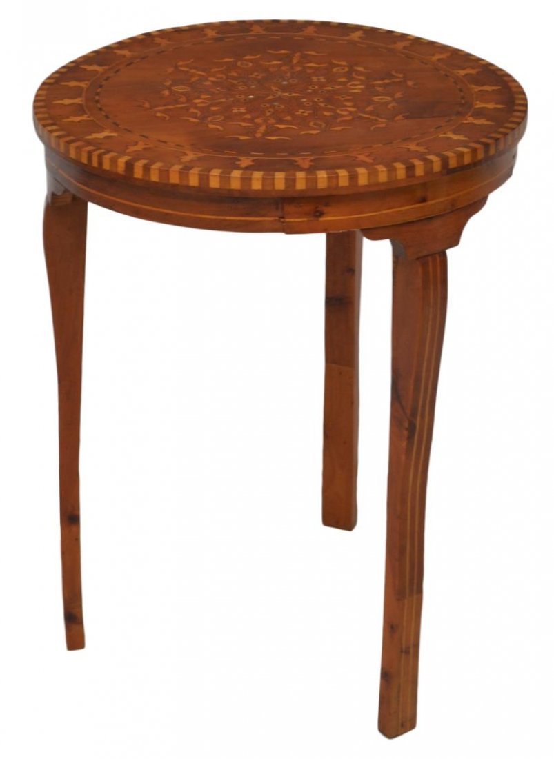 INLAID ARABESQUE CIRCULAR TOP TABLE: Diminutive Arabesque table having a circular top with foliate and geometric inlay accented with mother of pearl, shaped legs, 24.25"h, 19.5"d *Provenance: The estate of Douglas B. Marshall (1917-2007)