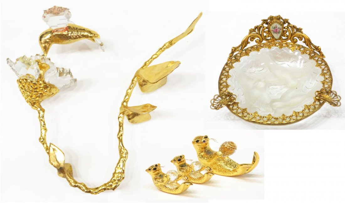 (5) DECORATIVE GILT METAL & CRYSTAL CABINET PIECES: (lot of 5) Decorative gilt metal and crystal cabinet items, comprising: (3) otters, each holding faceted crystal ball, one titled 'La Melodie' c. 1980, two illegibly signed verso, one with restoration