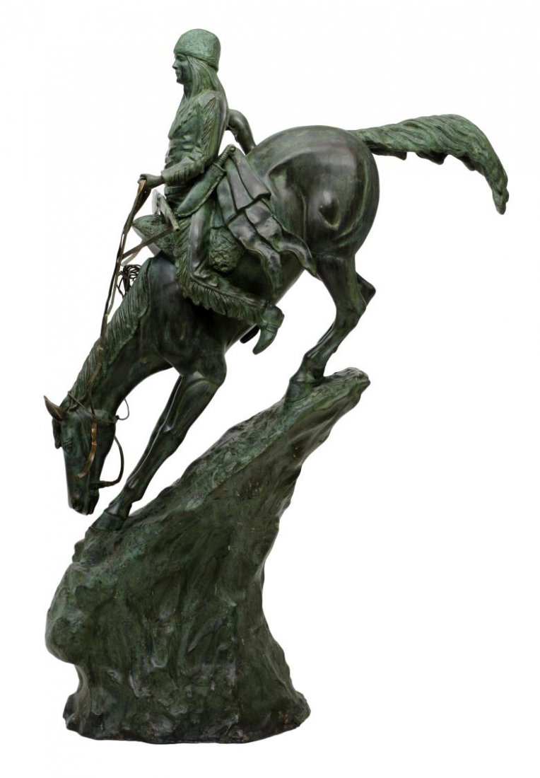 MONUMENTAL BRONZE AFTER REMINGTON MOUNTAIN MAN 78": Patinated bronze sculpture, "The Mountain Man" after the original by Frederick Sackrider Remington (American, 1861-1909), Remington copyright 1903, 78"h, 57"w, 26"d **Provenance: "Mesquite Charlie's" 
